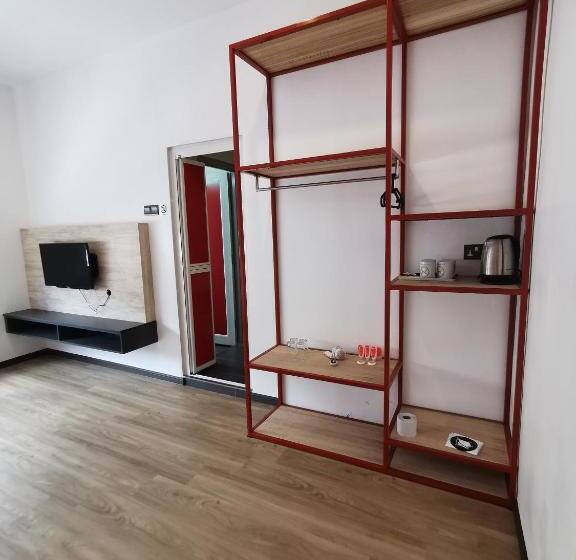 חדר משפחתי, Tt Dorf Hotel Matang