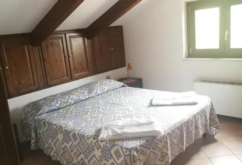 Ullakkohuone, Residence Il Casale