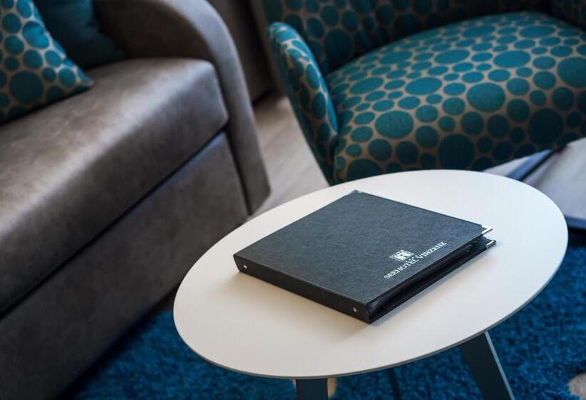 Superior room with lake view, Seehotel Vinzenz