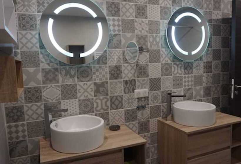 디럭스 룸, L'appollu