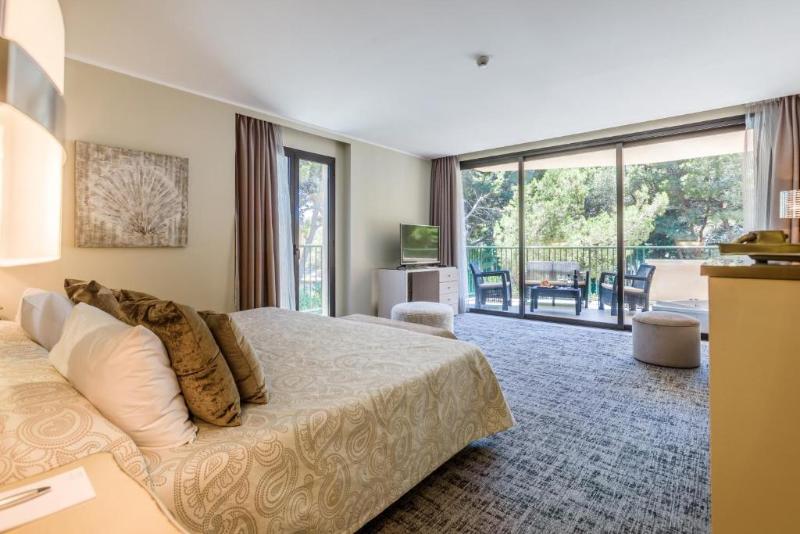 غرفة قياسية سرير كينج, Inn Of America   Palm Beach Gardens