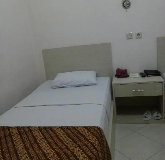 Quarto Estandar, The Amrani Syariah