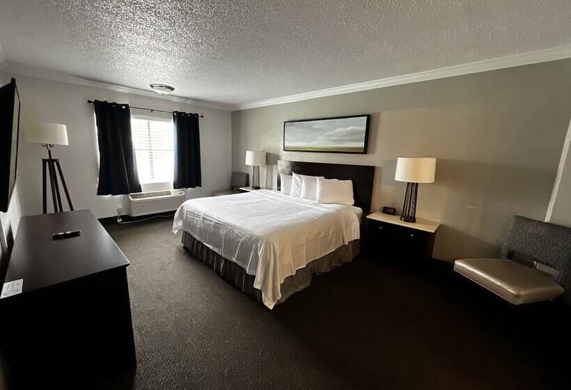 جناح ديلوكس سرير كينج, At Home Inn   Pensacola