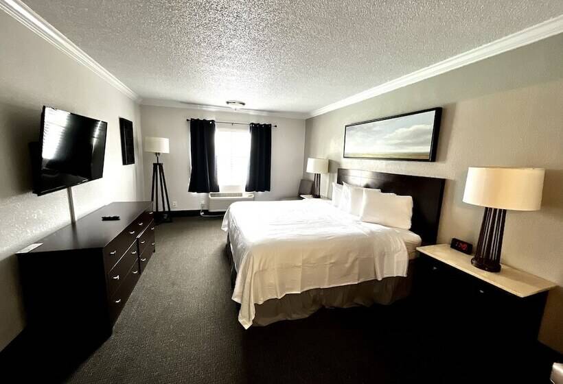 디럭스 스위트 킹 침대, At Home Inn   Pensacola