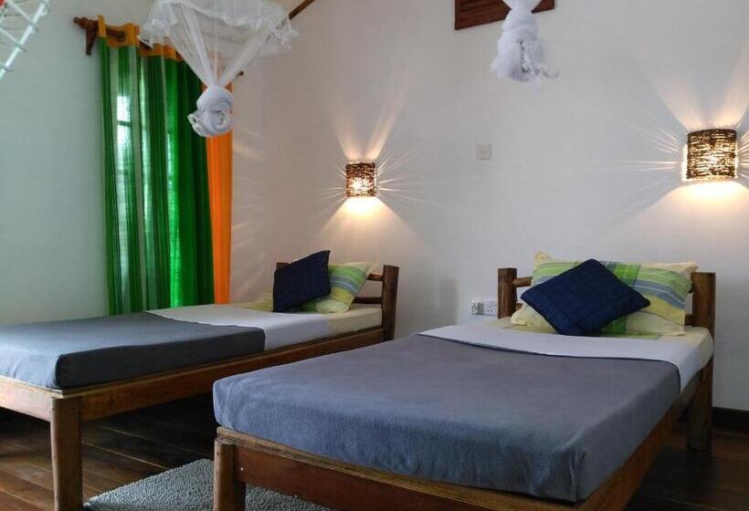 غرفة قياسية, Ella Rawana Den