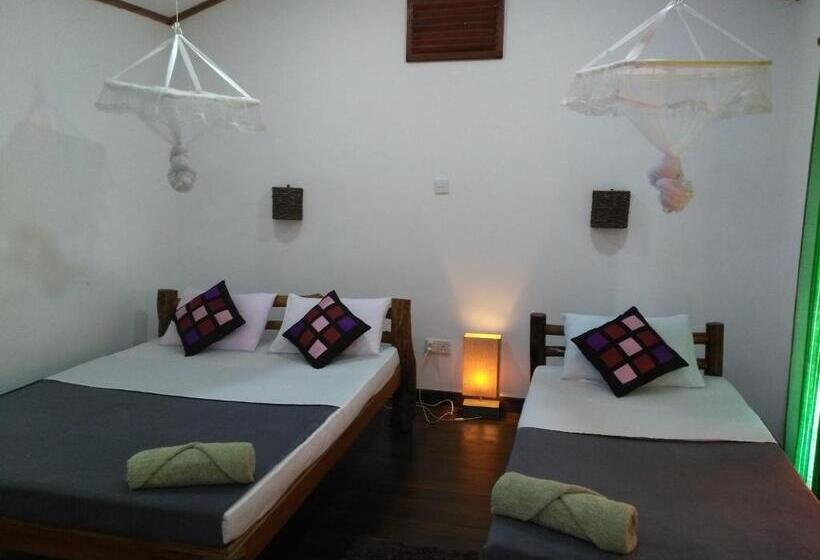 غرفة قياسية ثلاثية, Ella Rawana Den