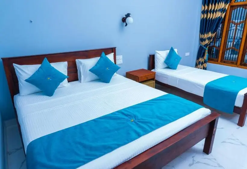 Quarto Triplo Deluxe, Mrd Beach