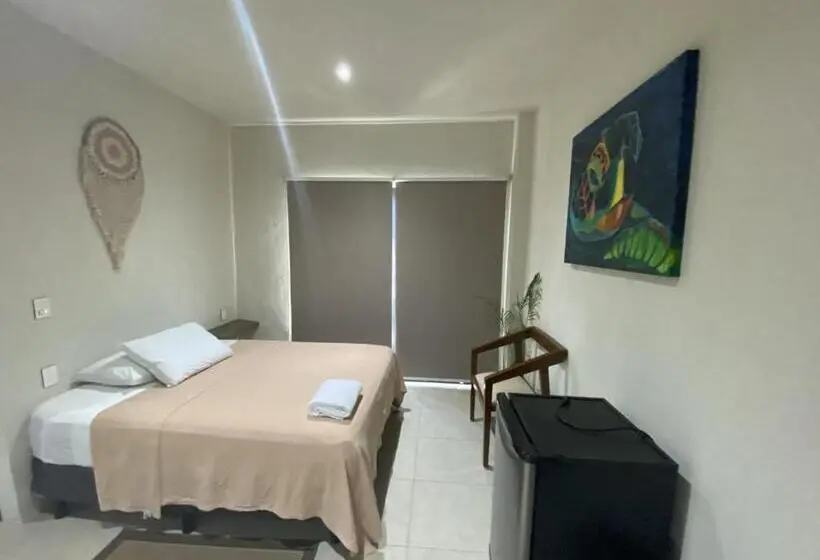 اتاق استاندارد چهار تخته با چشم‌انداز دریا, Cuxos Hotel Beachfront