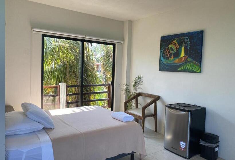 غرفة قياسية رباعية مطلة على البحر, Cuxos Hotel Beachfront