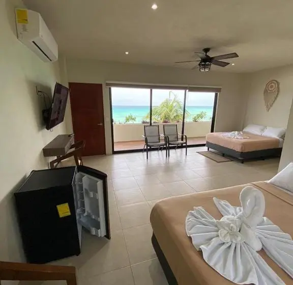 اتاق استاندارد چهار تخته با چشم‌انداز دریا, Cuxos Hotel Beachfront