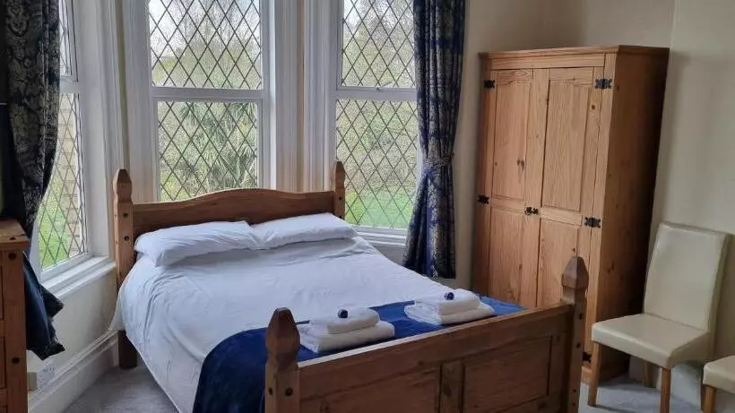 Quarto Triplo Deluxe Vista Mar, Rowcroft Lodge