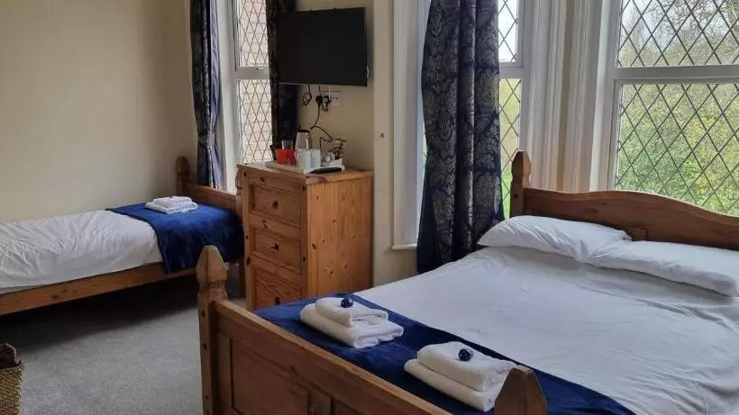 Quarto Triplo Deluxe Vista Mar, Rowcroft Lodge