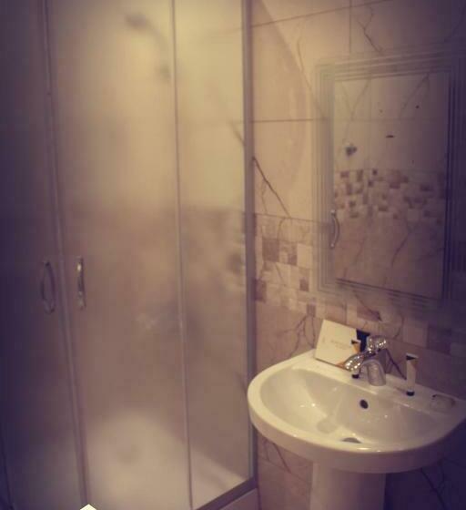 Quarto Estandar Individual, شقق الزوايا الهادئه للشقق المخدومة   اقتصادي