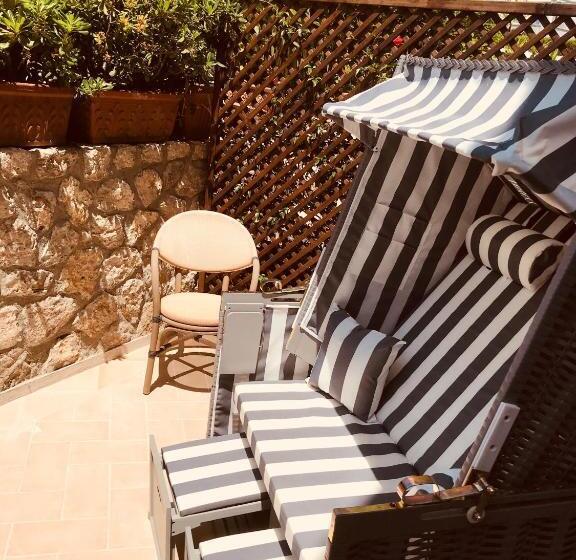 Quarto Deluxe, Capri Bougainville