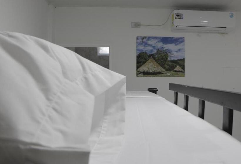 共用房间的床, Puerto Caribe Hostal