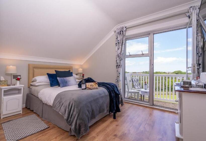 オーシャンビューデラックスルームバルコニー付き, Coral Gables Guesthouse & Campsite