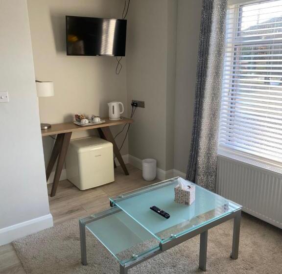 キングサイズベッドのスイートルーム, Coral Gables Guesthouse & Campsite