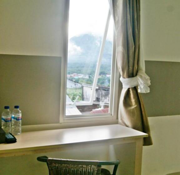 Quarto Estandar Vista Montanha, Leos