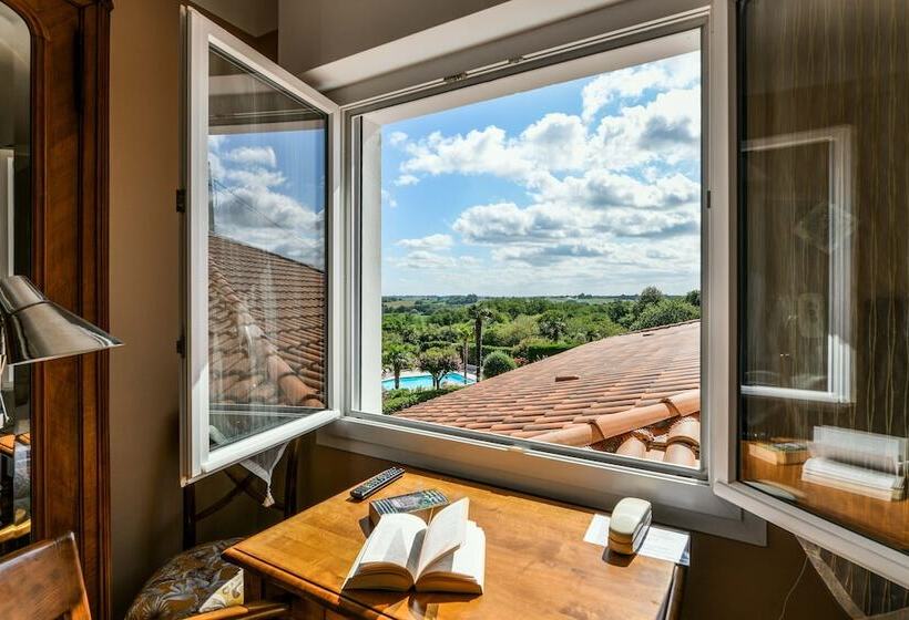 חדר סופריור, Aux Tauzins