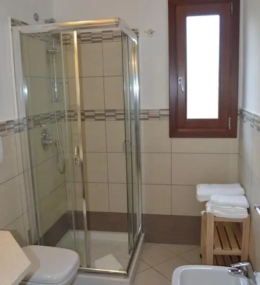 اتاق استاندارد سه تخته با چشم‌انداز باغ, Guest Rooms Affittacamere