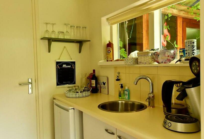 Номер Стандарт Вид на Сад, De Veldeling