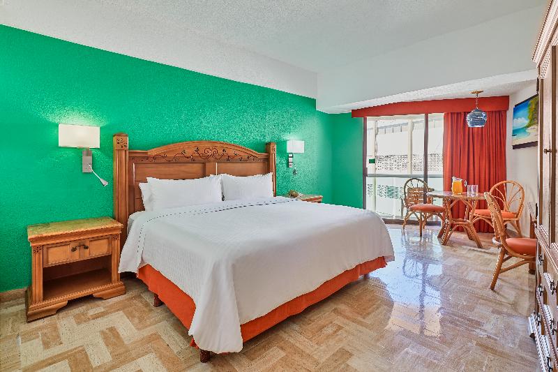 חדר דחוקס עם מיטת קינג, Gamma Acapulco Copacabana