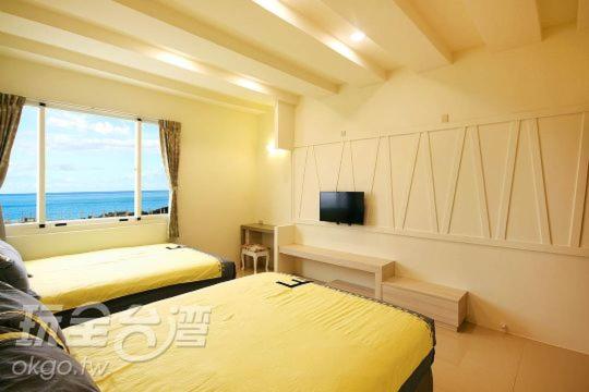 اتاق استاندارد چهار تخته با چشمانداز دریا, Green Island Dolphin House