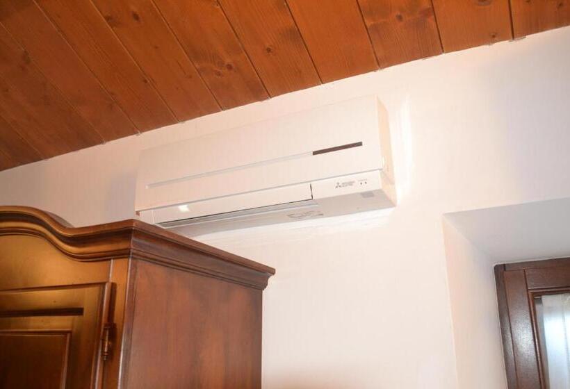 חדר סטנדרט לשלושה עם נוף לגינה, Agriturismo Montorso