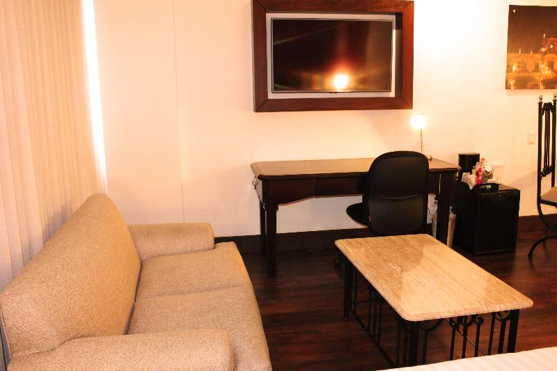 キングサイズベッドのスタンダードルーム, Holiday Inn Hotel & Suites Centro Historico, An Ihg