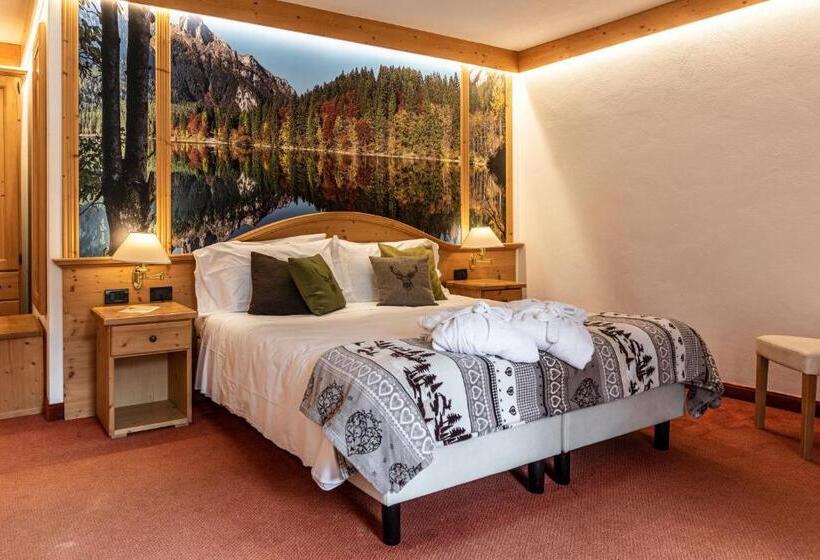 חדר סופריור לשלושה, Caminetto