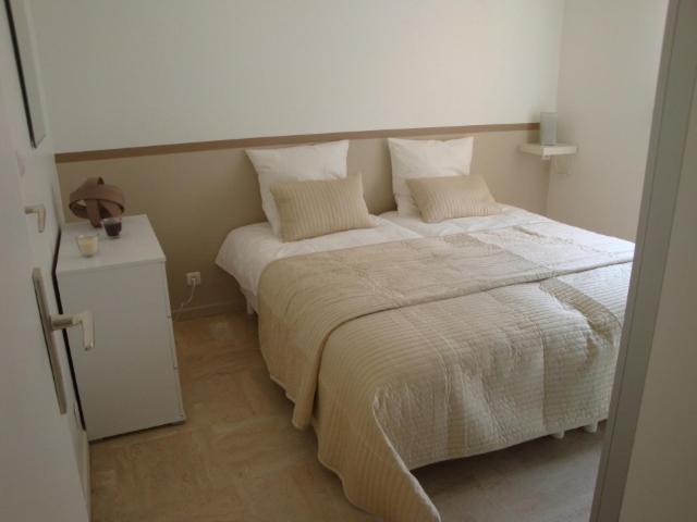 带1个卧室的公寓, Esperanto