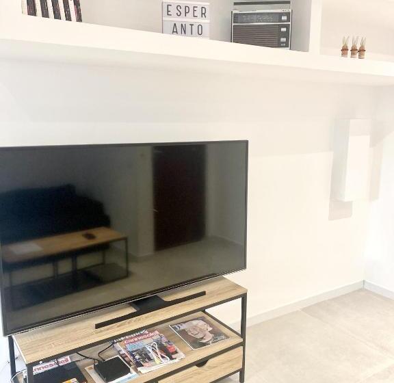 带1个卧室的公寓, Esperanto