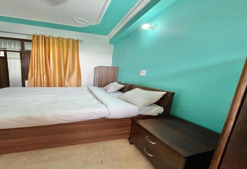 Üç Kişilik Klasik oda, Capital O Kanha Guest House