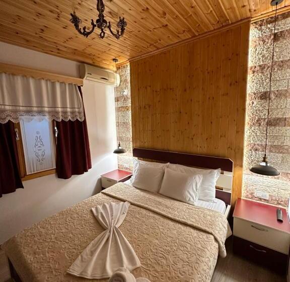 اتاق استاندارد با چشم‌انداز باغ, Mani Guest House