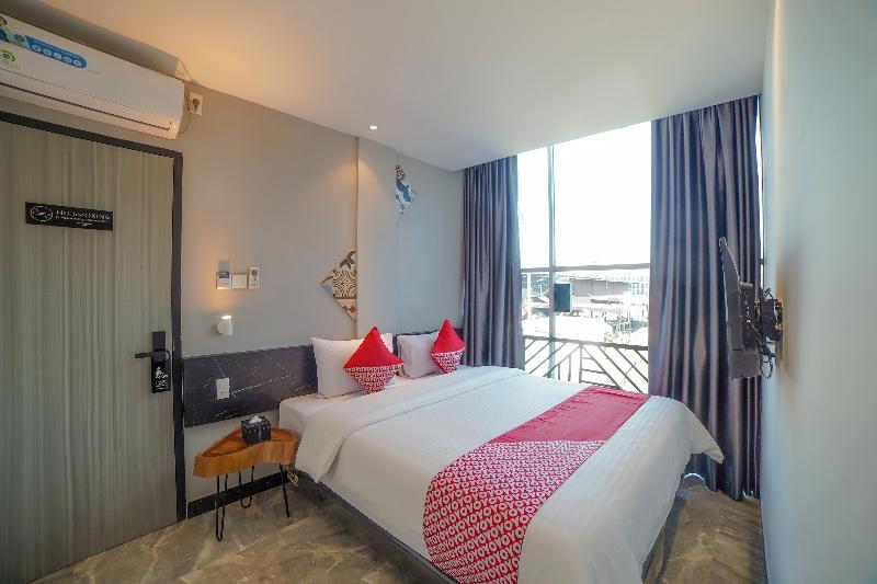 Quarto Deluxe, Capital O 90447 Kardopa Hotel Megapark