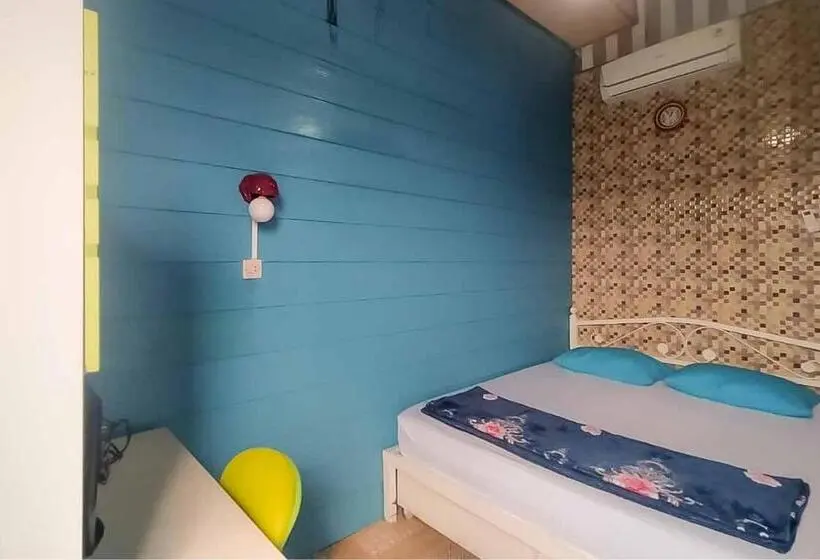 スタンダードルーム, D H Mansion La Rosa Syariah Sentul Mitra Reddoorz
