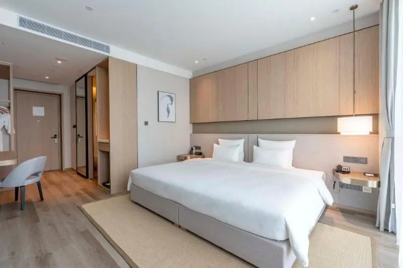 キングサイズベッドのデラックスルーム, Novotel Shanghai Qingpu Excellence