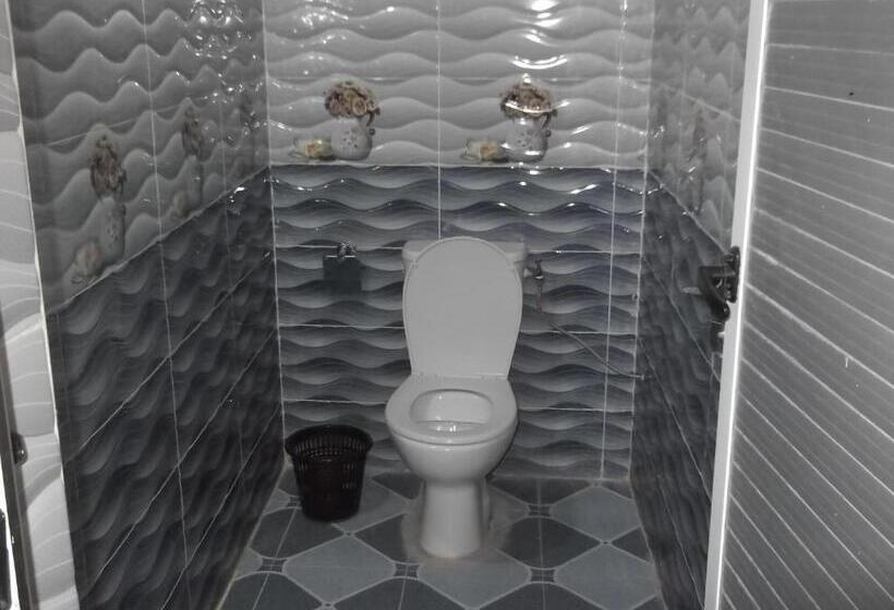 اتاق راحتی سه تخته, Tifinagh Guest House