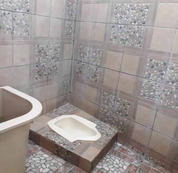 غرفة قياسية ثلاثية, Ahza Syariah