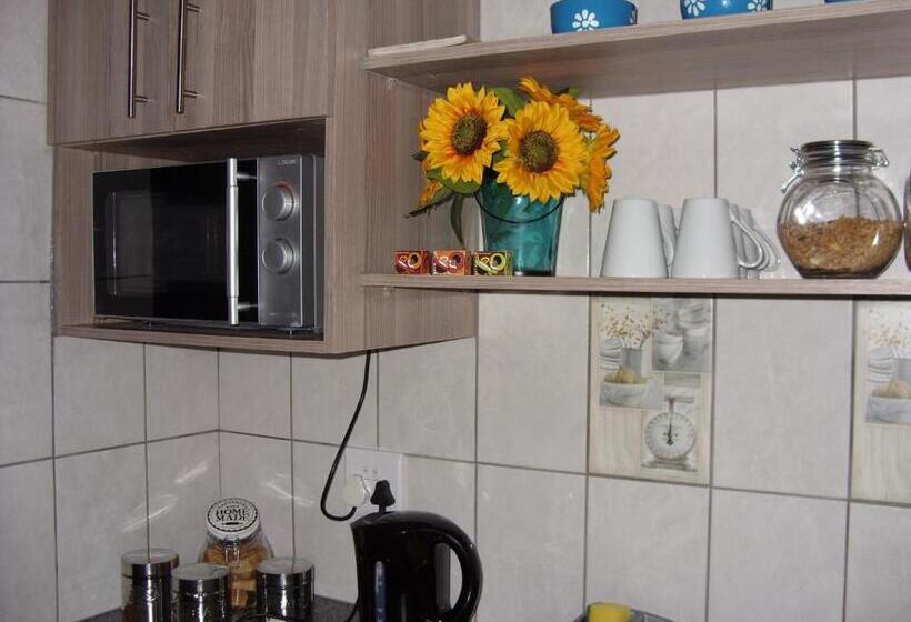 Quarto deluxe, Little Umhlanga. Sunflower Suite