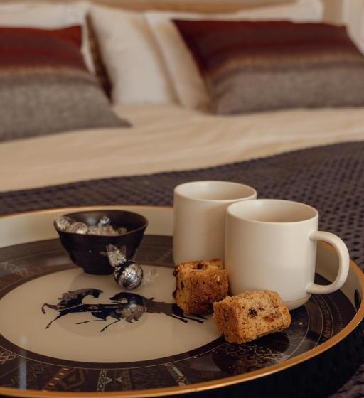 발코니가 있는 스위트, The Bean Tree