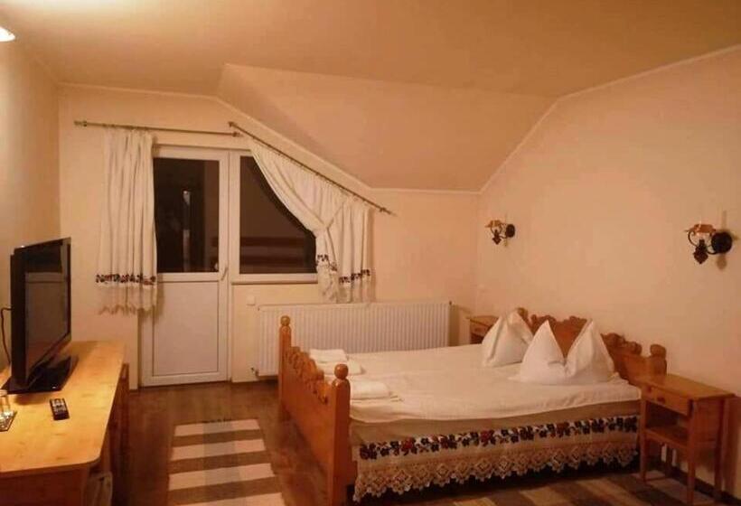 חדר משפחתי, Pensiunea Amethyst