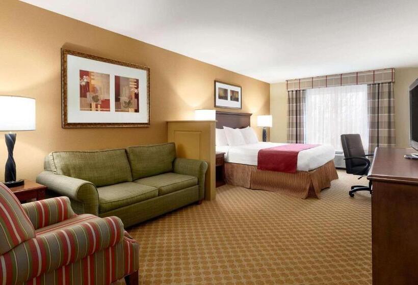 מיטת קינג בסוויטה, Country Inn & Suites By Radisson St. Peters Mo