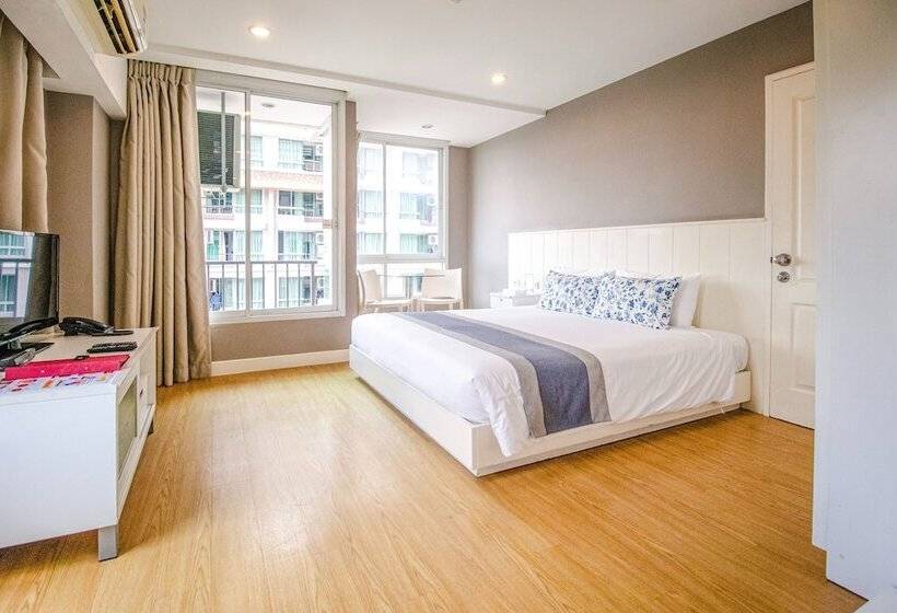 Quarto Deluxe, Cinnamon Hotel Bangkok