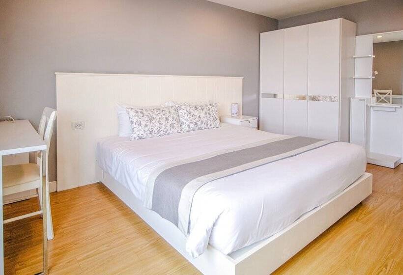 Quarto Deluxe, Cinnamon Hotel Bangkok