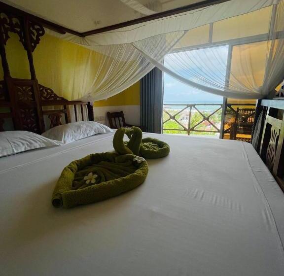 חדר דלוקס לשלושה עם נו לים, Villa Vanilla Kendwa