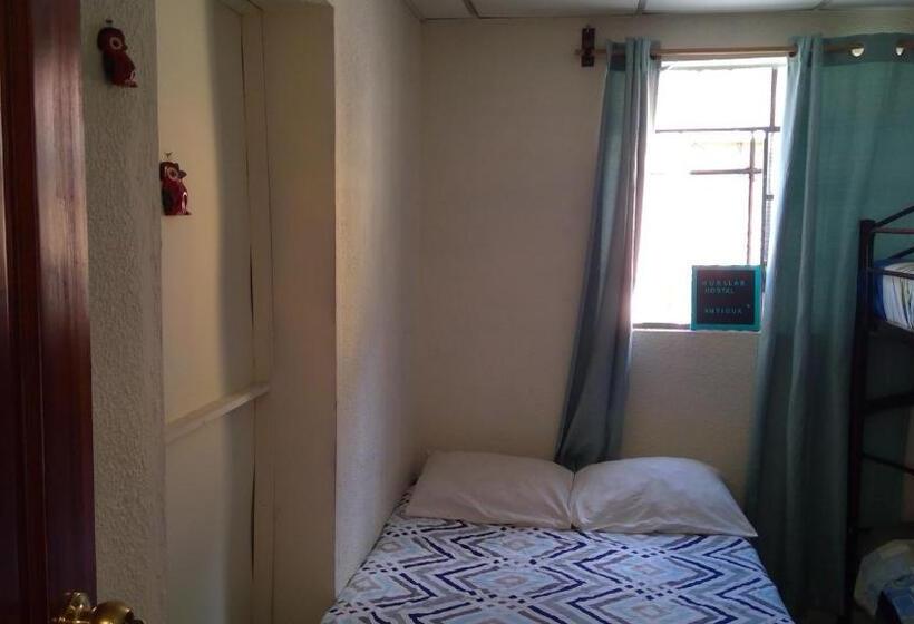 اتاق چهار تخته با دستشویی مشترک, Huellas Hostal Antigua