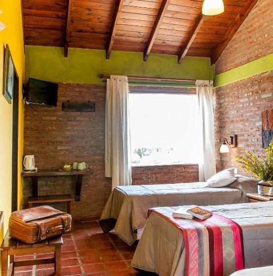 Quarto Triplo Deluxe, Posada Larsen