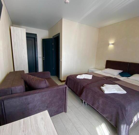 Quarto Triplo Deluxe, Naciku Spa