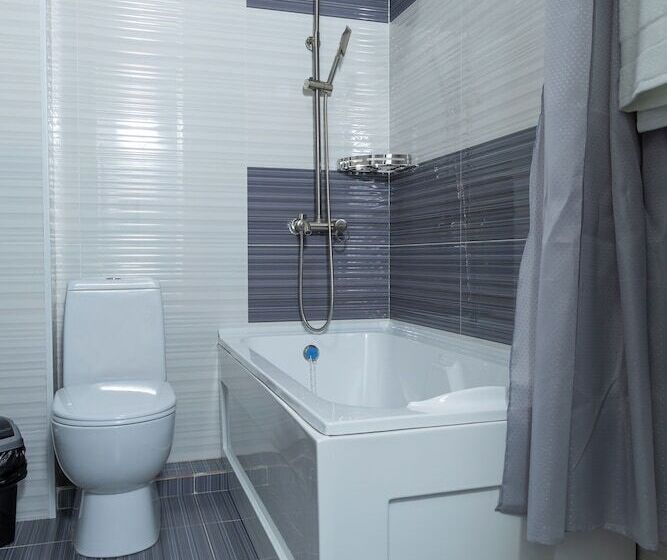 Habitació Deluxe, The Time